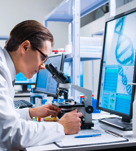 researcher-looking-through-microscope